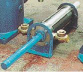 Hydraulically linked chemical dosing cylinder