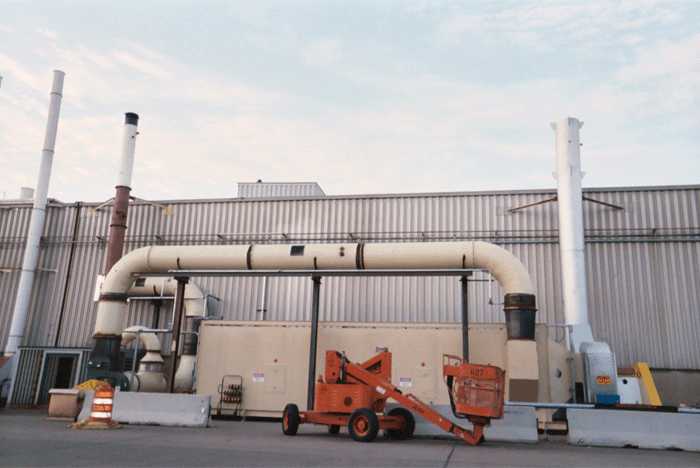 20,000 cfm recuperative thermal oxidizer to oxidize unburned hydrocarbons, VOC`s and CO generated by the plant. `Front view looking at residence chamber.`